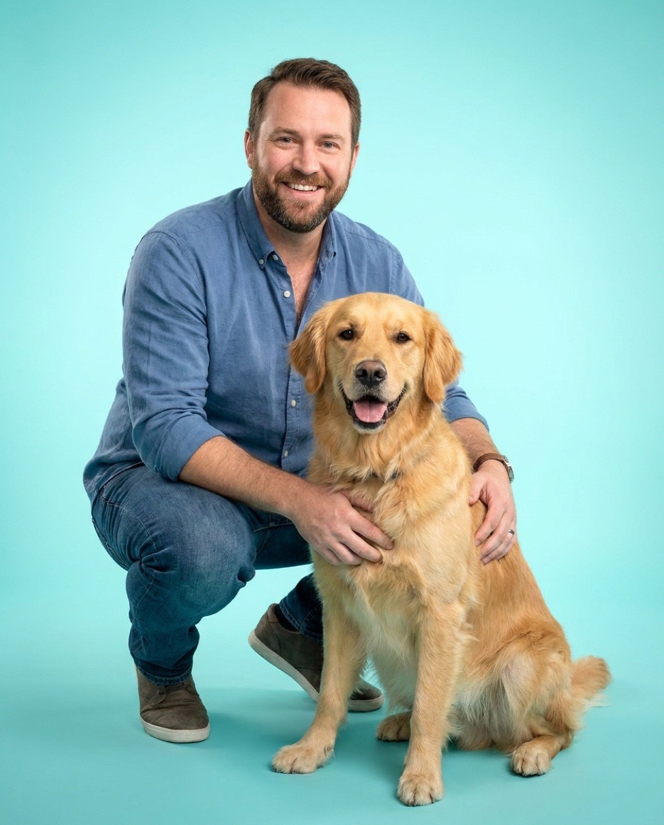 An owner sitting with their dog
